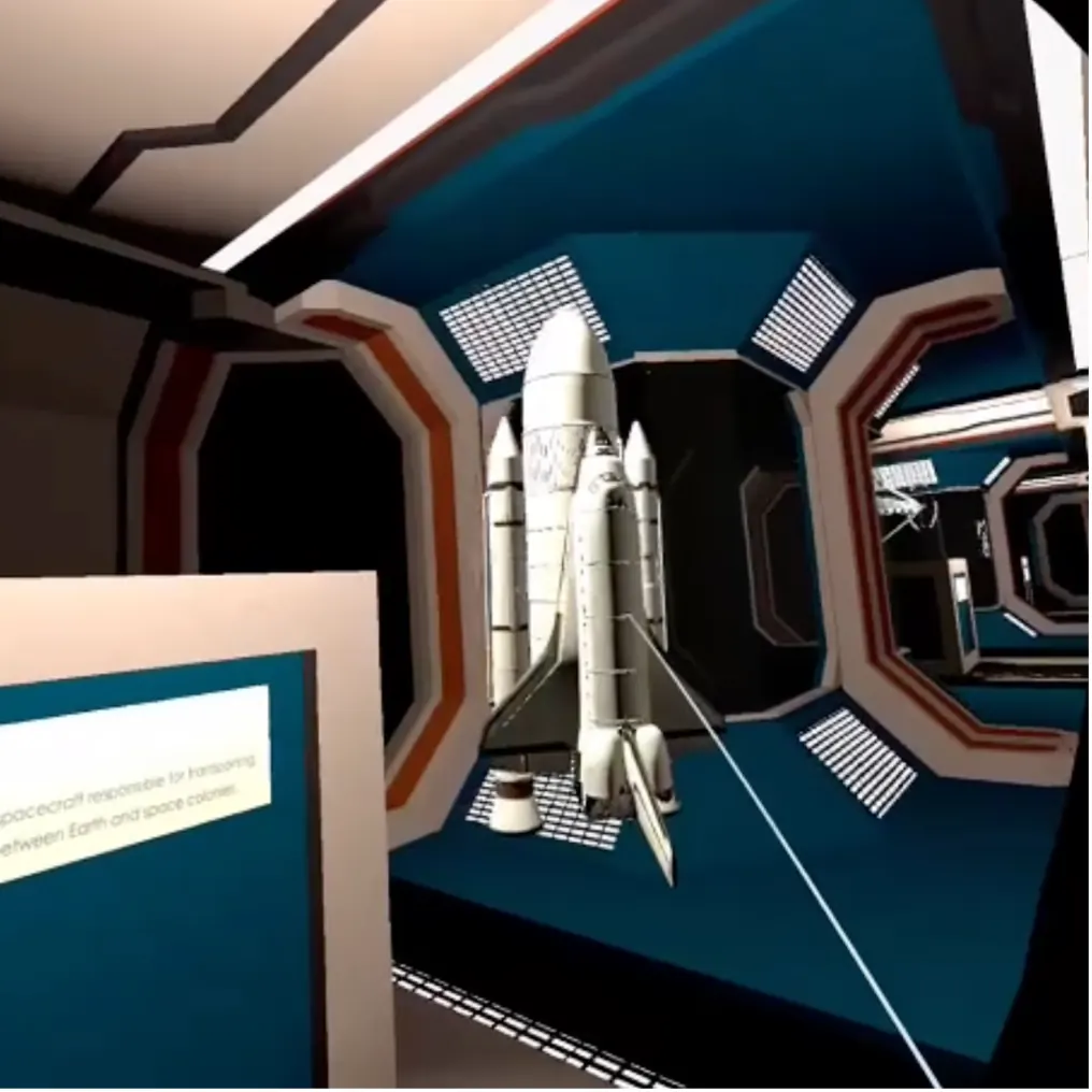 Visitor hand interacting with a spacecraft exhibit in VR